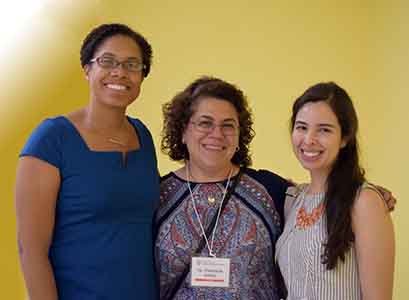 panelists pose after the symposium breakout session