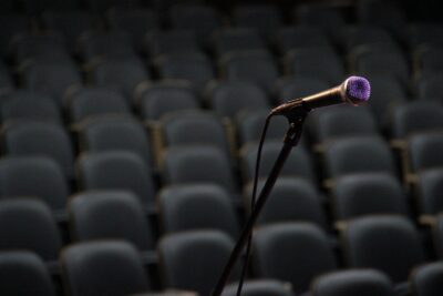 microphone with empty chairs