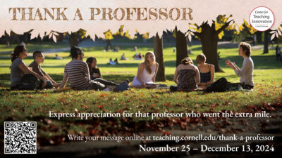 Group of students sitting on green grass among trees